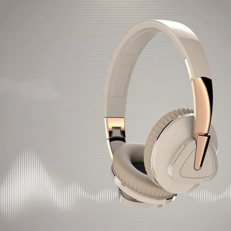 Black wireless over-ear Bluetooth headset with all-inclusive ear cups, showing AUX port and control buttons.
