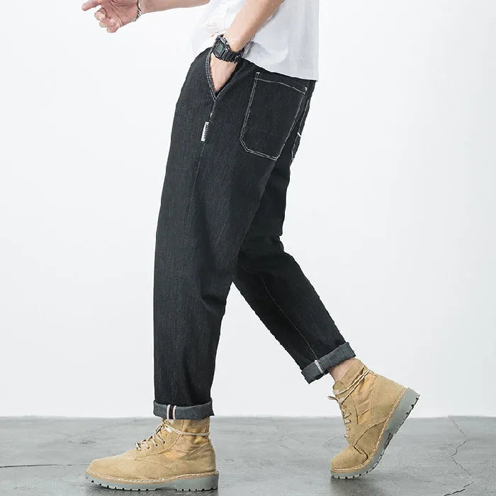 Men's loose plus size elastic waist straight leg jeans in blue denim