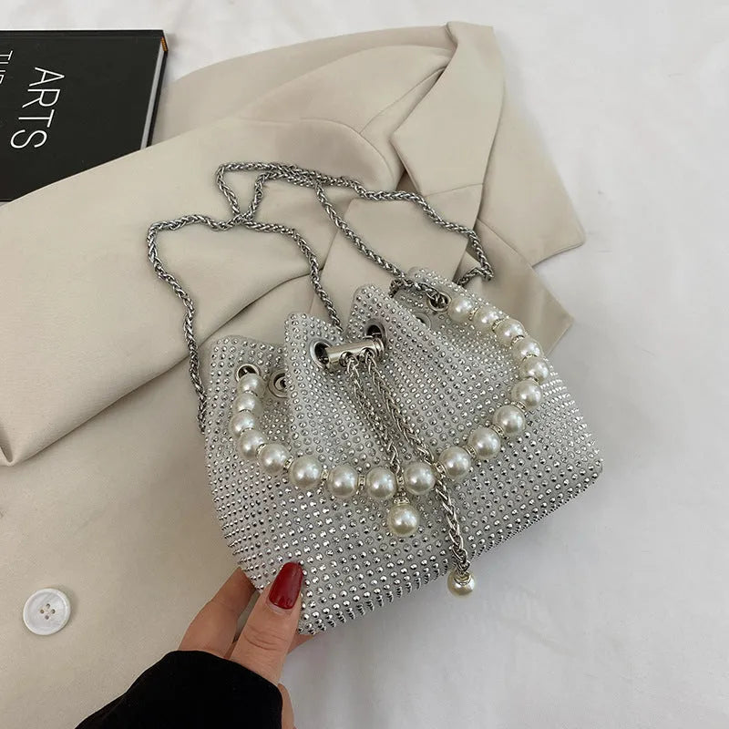 Western style light diamond crossbody bag with chain strap and bucket shape design in multiple colour options