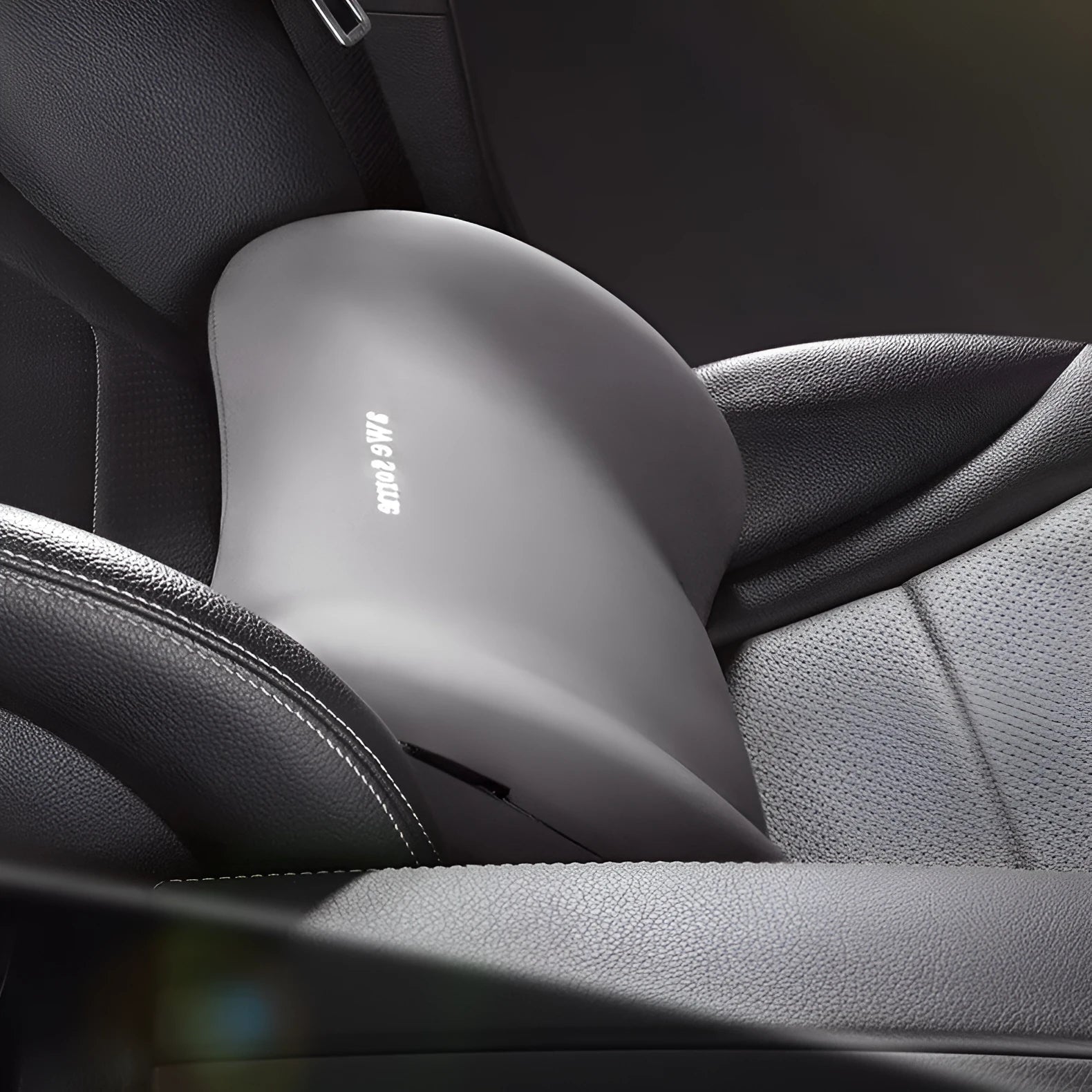 Black cloth headrest pillow and matching lumbar support pillow for car seats.