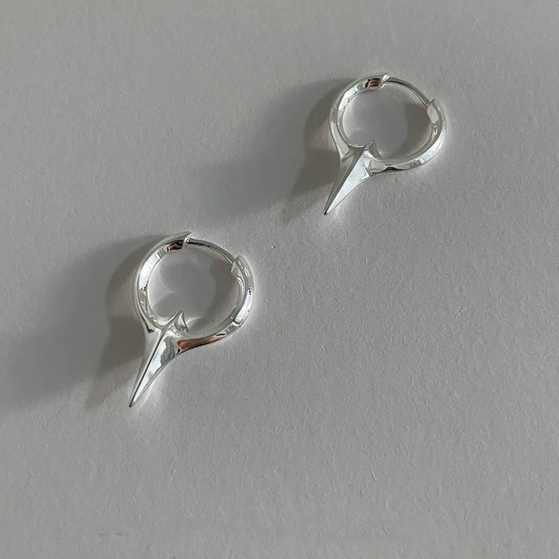 Geometric star-shaped ear clips for women with electroplated copper construction and metallic finish