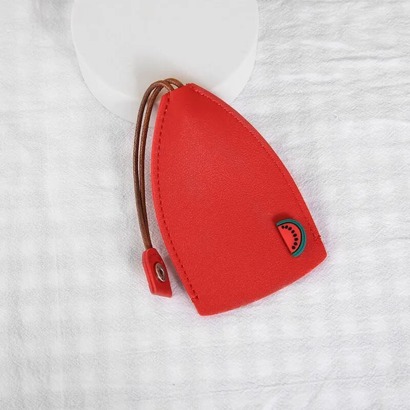 Colourful cartoon PU leather pull-out key case for car keys, shown open and closed