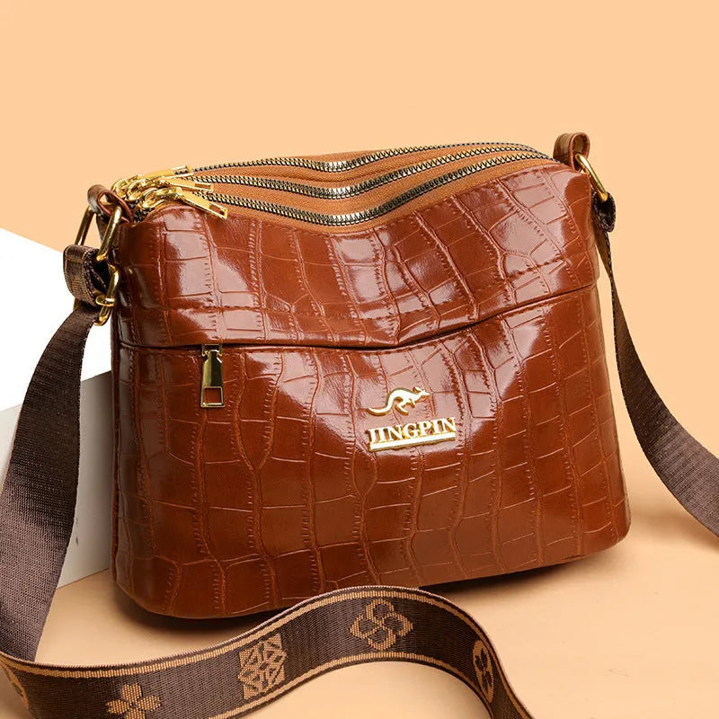 Brown PU leather cross body messenger bag with multiple compartments and sandwich pockets