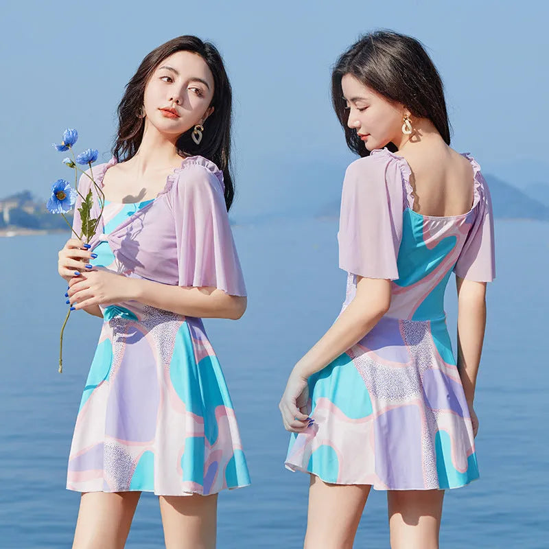 Women's high-waist floral one-piece swimsuit in light purple or light blue colours