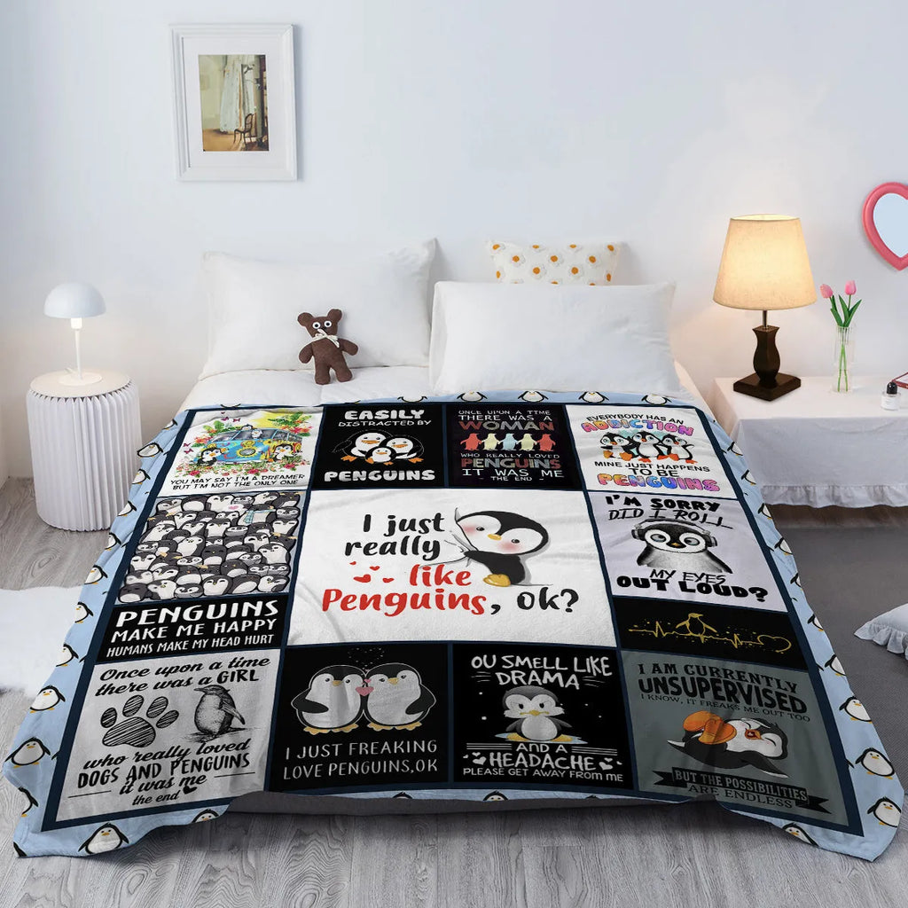 Multicoloured penguin flannel velvet throw blanket on sofa with hemmed edges