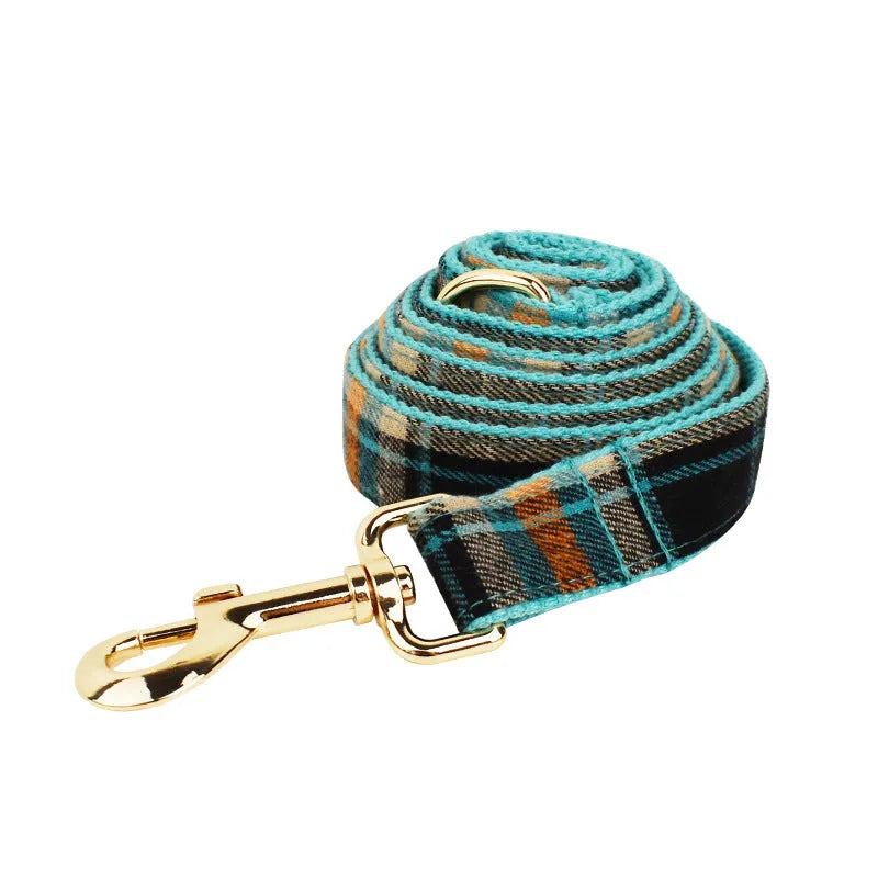 Green retro style cloth dog collar, leash, bow, and vest set displayed as a four-piece package.