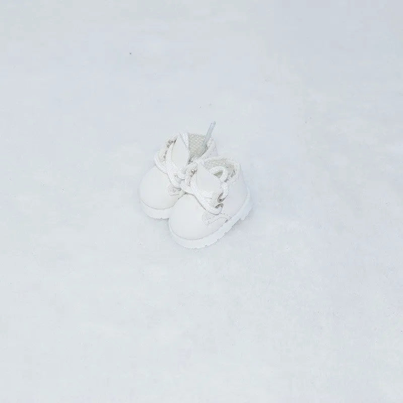 A pair of polyurethane doll shoe accessories for a 17cm figure, shown in a selected style and colour.