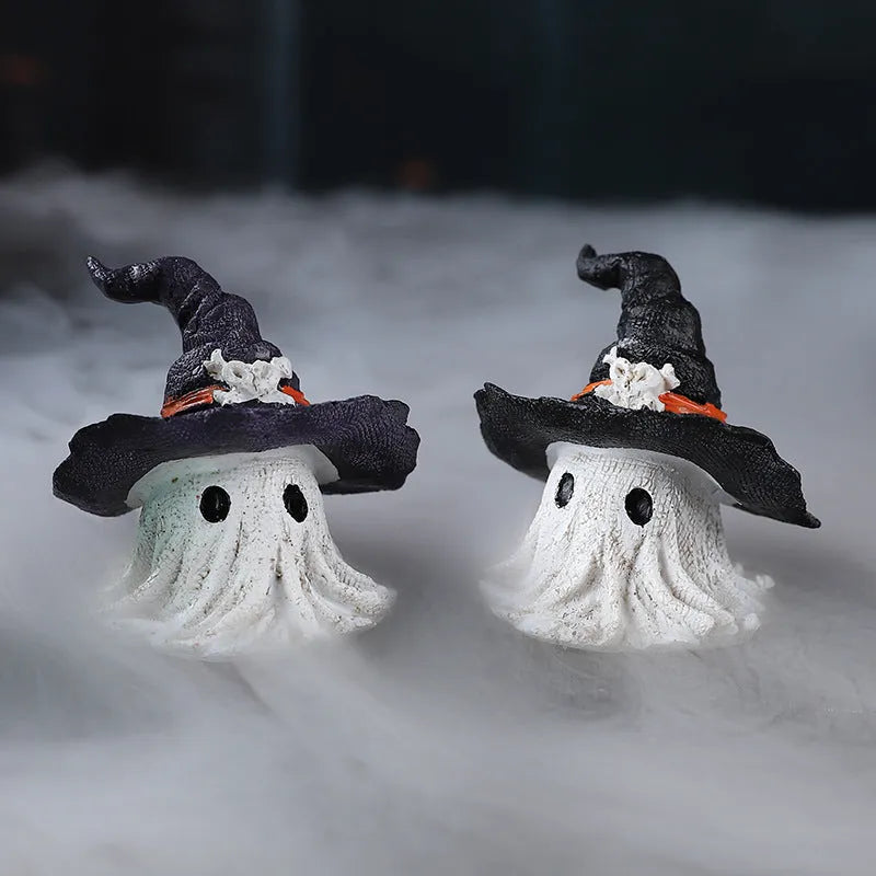 Resin wizard hat holiday ornament in purple and black colour options.
