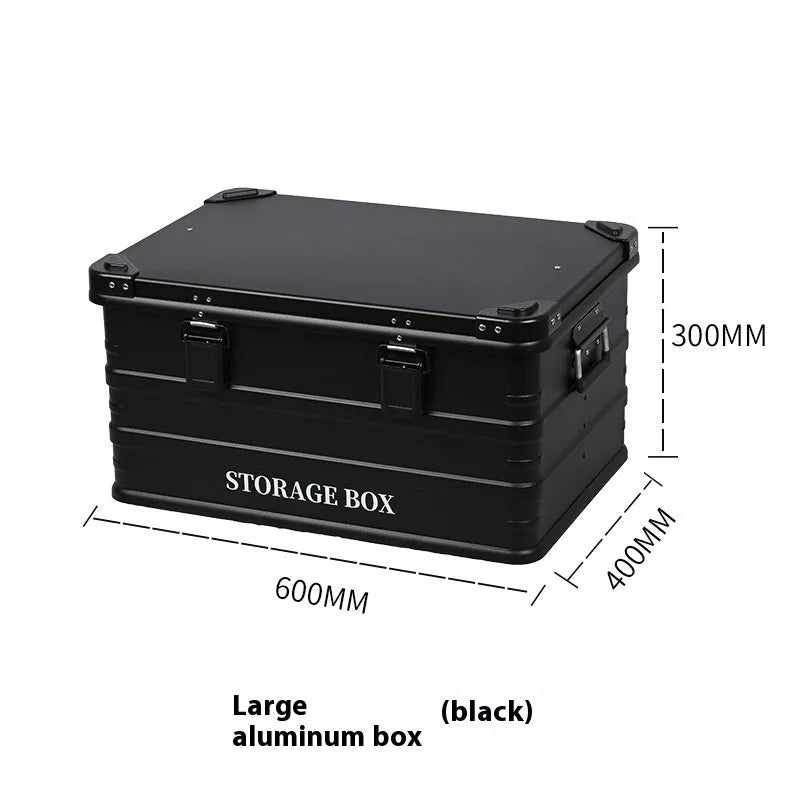 Army green waterproof plastic storage box sitting in a car boot
