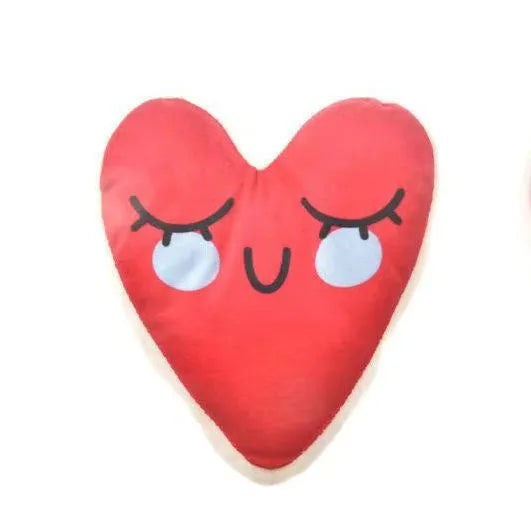 Vocalising plush dog chew toy in peach heart pink colour for dental play and bite resistance.