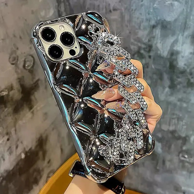 Silver iPhone case with a connected chain bracelet and a flash diamond lock clasp.