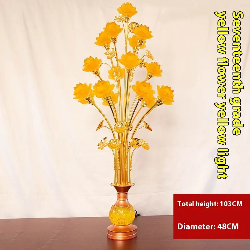 Coloured glaze pink and yellow LED lotus lantern for Buddha worship on an alloy stand.