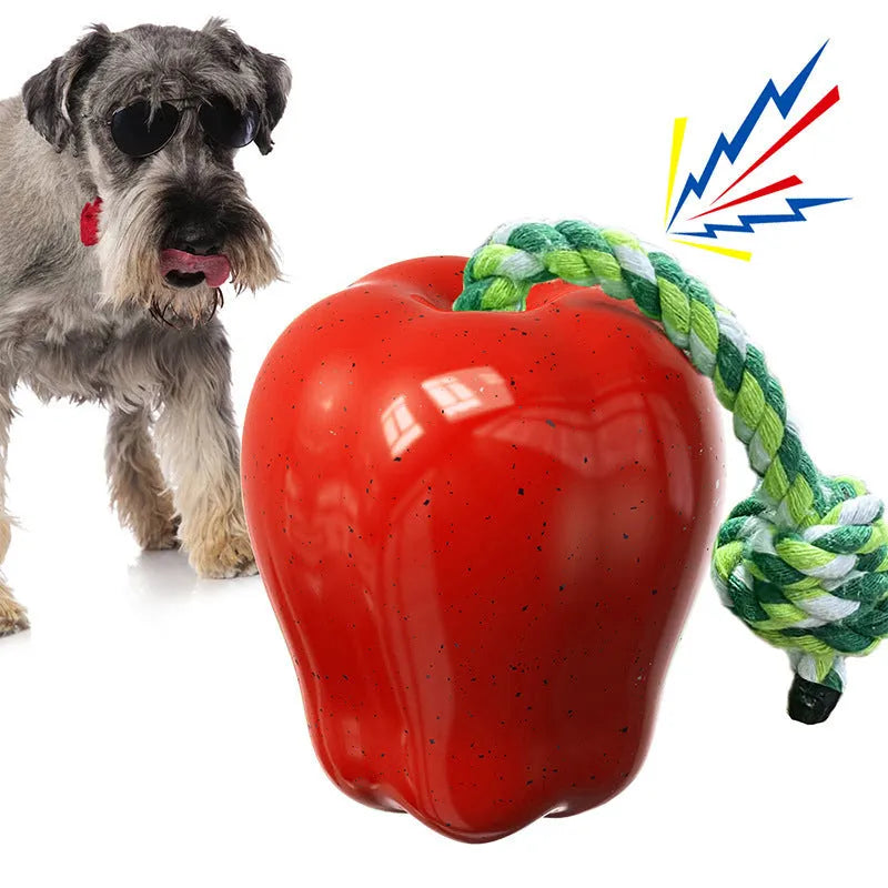 Green and red plastic dog dental ball toys with textured surfaces and hollow interactive feeder design