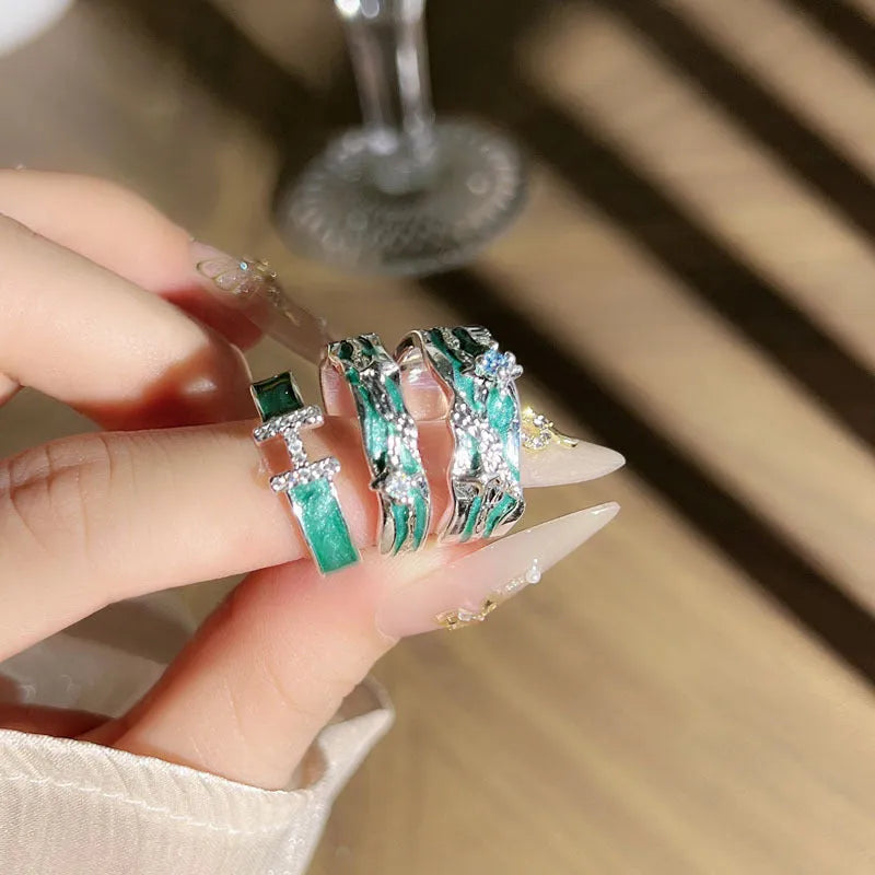 Mint green enamel copper ring with asymmetric folding design and asterism star motif