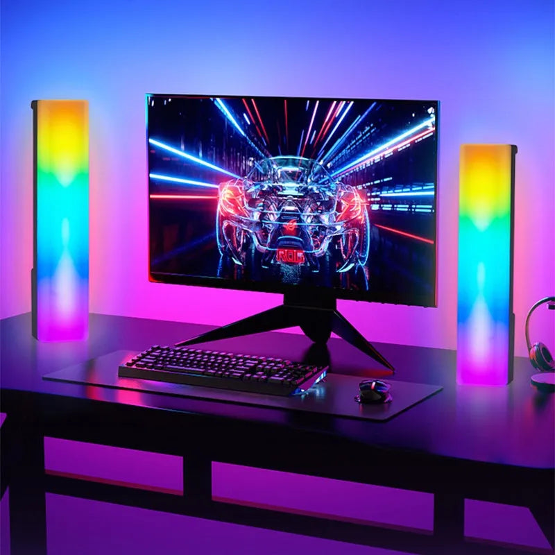 3D RGB voice-activated table lamp with colourful lights on a desk, showing white shell option.