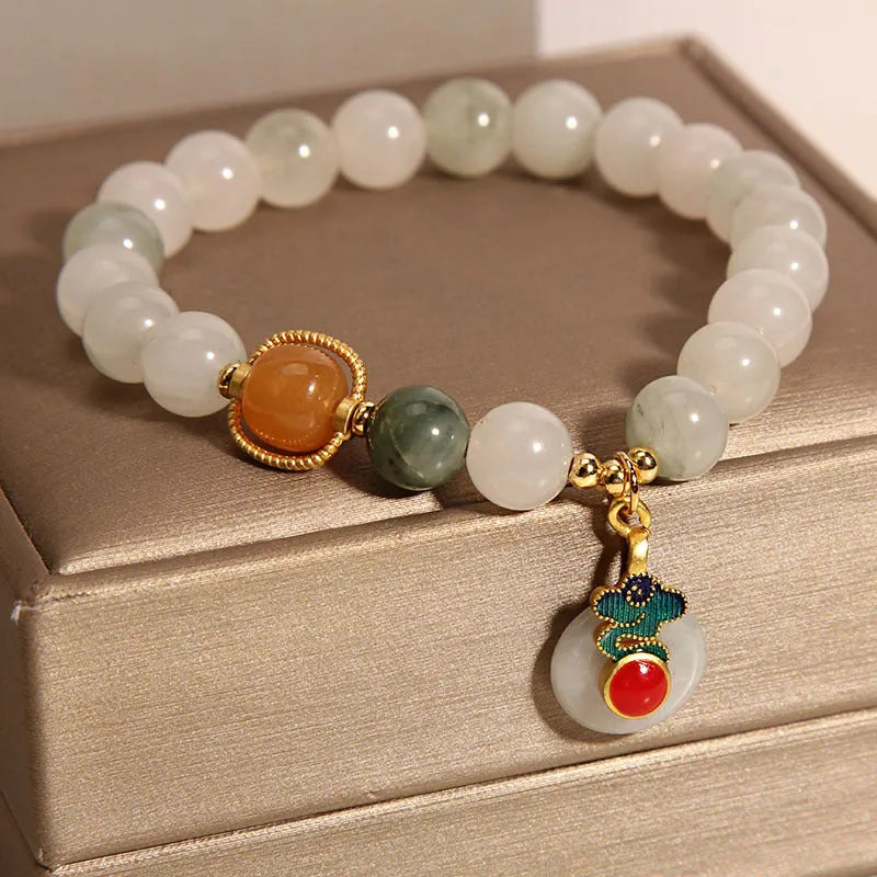 Women's jade crystal bracelet with ice jade colour, xiangyun patterns and pearl decorative elements
