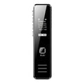 Small black or gold portable digital voice recorder with USB cable on a desk.