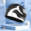 Silicone swimming cap with whale tail pattern and waterproof ear protectors in multiple colour options