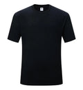 Plain black slim fit cotton t-shirt with round neck and short sleeves on a hanger.
