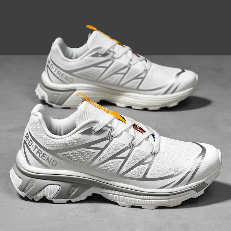 Men's and women's low-top outdoor hiking shoes in khaki with lace-up front and rubber sole.