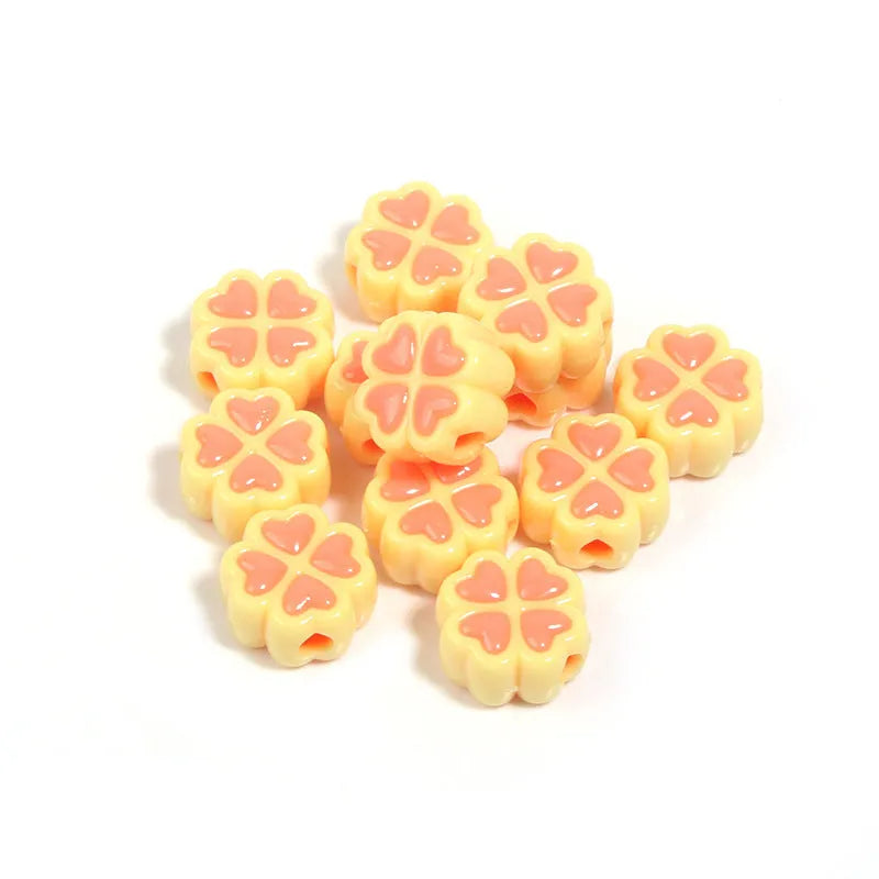 15mm frosted acrylic four-leaf clover love beads in mixed colours including pink, blue, and green