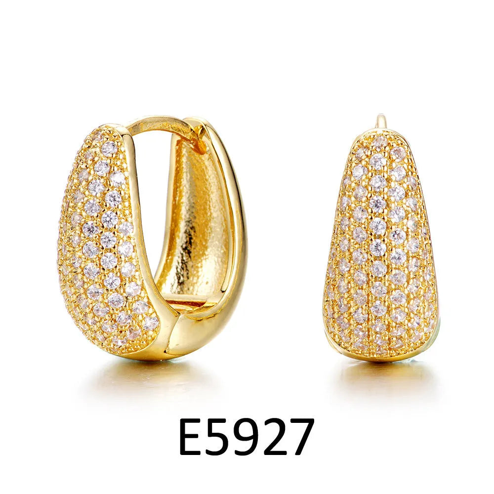Brass gold plated heart-shaped zircon ear clip earrings with gang drill detailing