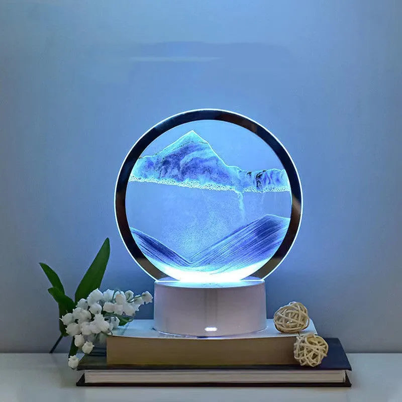 Creative 3D quicksand table lamp with glass shade and USB cable, showing touch control and coloured light options.