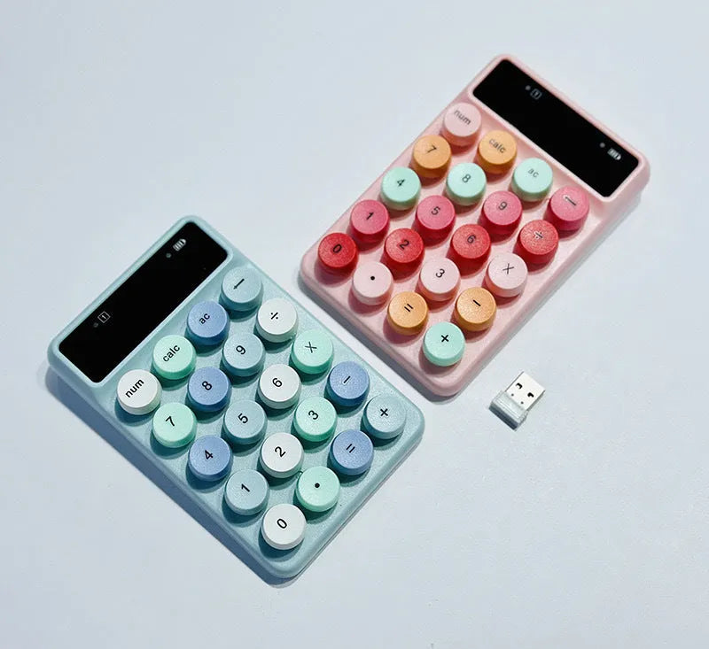 Q3 wireless mini keyboard in Macaron colours on desk