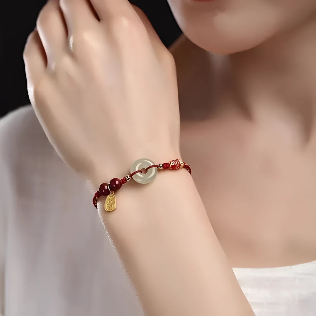 Hetian jade peace buckle bracelet with 10mm stone on a braided rope