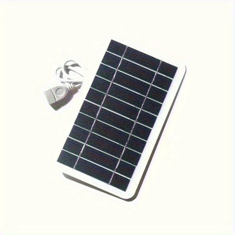 Portable solar panel charger measuring 157x94mm with USB cable for mobile device charging