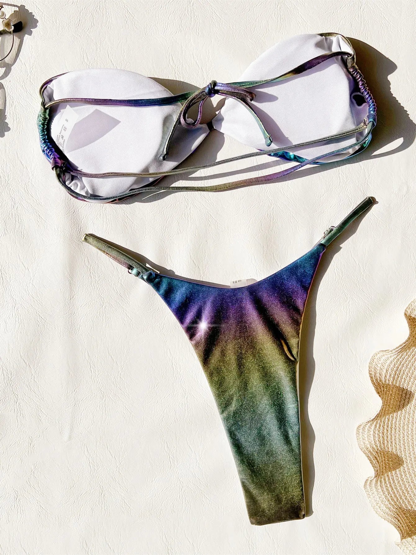 Women's gradient purple two-piece bikini swimsuit set on a mannequin.