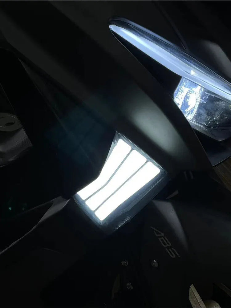 Pair of yellow LED cornering lamps for Tianying TS150 motorcycle retrofit installation.