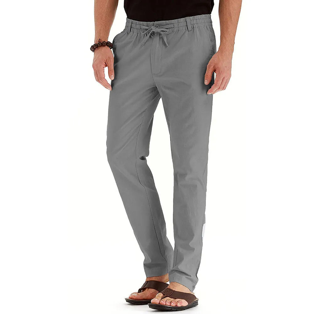 Men's loose oversized cotton blend straight-leg track pants in army green, front view