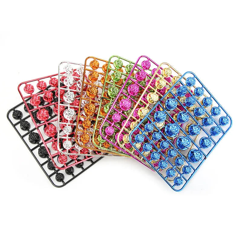 Set of 30 coloured ABS plastic motorcycle screw covers for engine and fairing customisation.