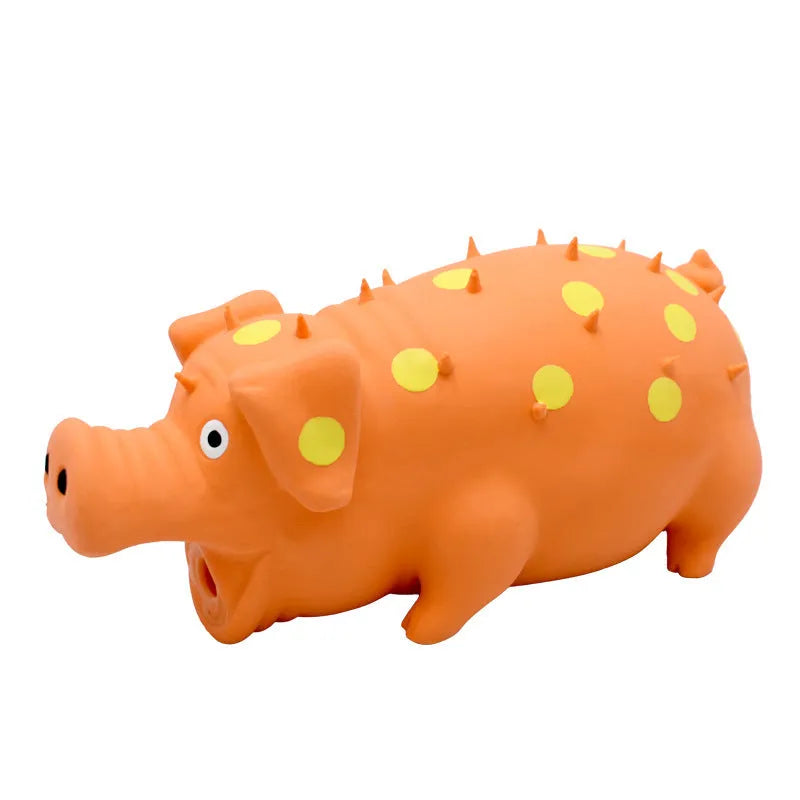 Blue latex pig-shaped dog chew toy with textured surface and squeaker on a wooden floor.