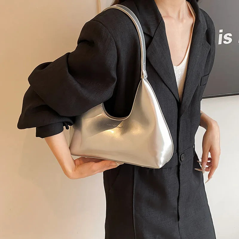 High Sense French PU shoulder bag in dumpling shape with sewing line detail and sandwich pockets