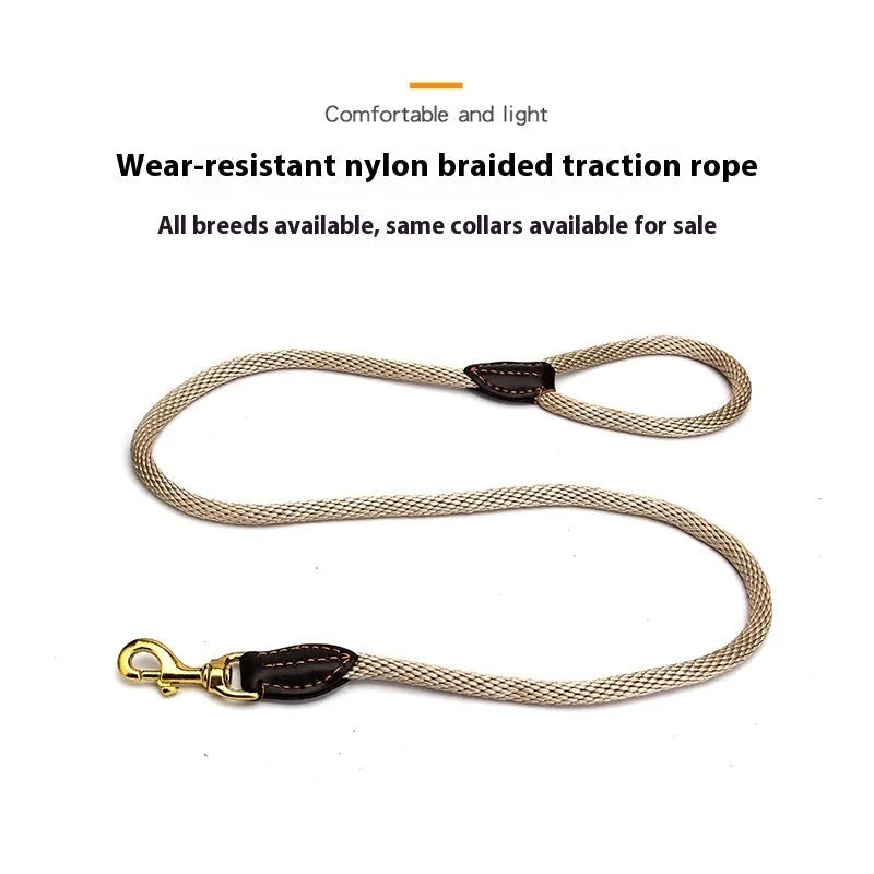 Nylon hand holding dog leash in black or brown with four diameter sizes for small to medium dogs.
