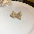 Real gold electroplated bow ring with inlaid zircon stone, size 12, golden bow design