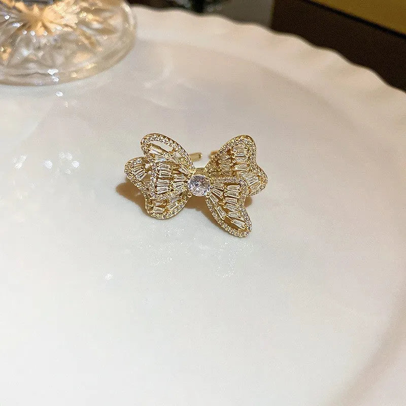 Real gold electroplated bow ring with inlaid zircon stone, size 12, golden bow design