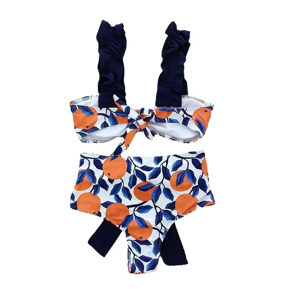Women's blue and orange printed high waist bikini swimsuit two-piece set on a white background