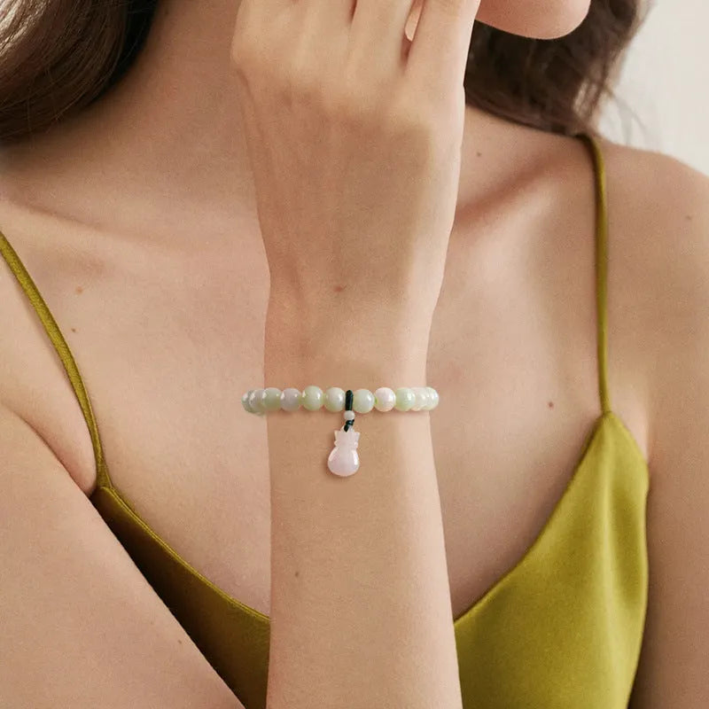 Jade stone bracelet with 8mm flower carving in unisex design for men and women