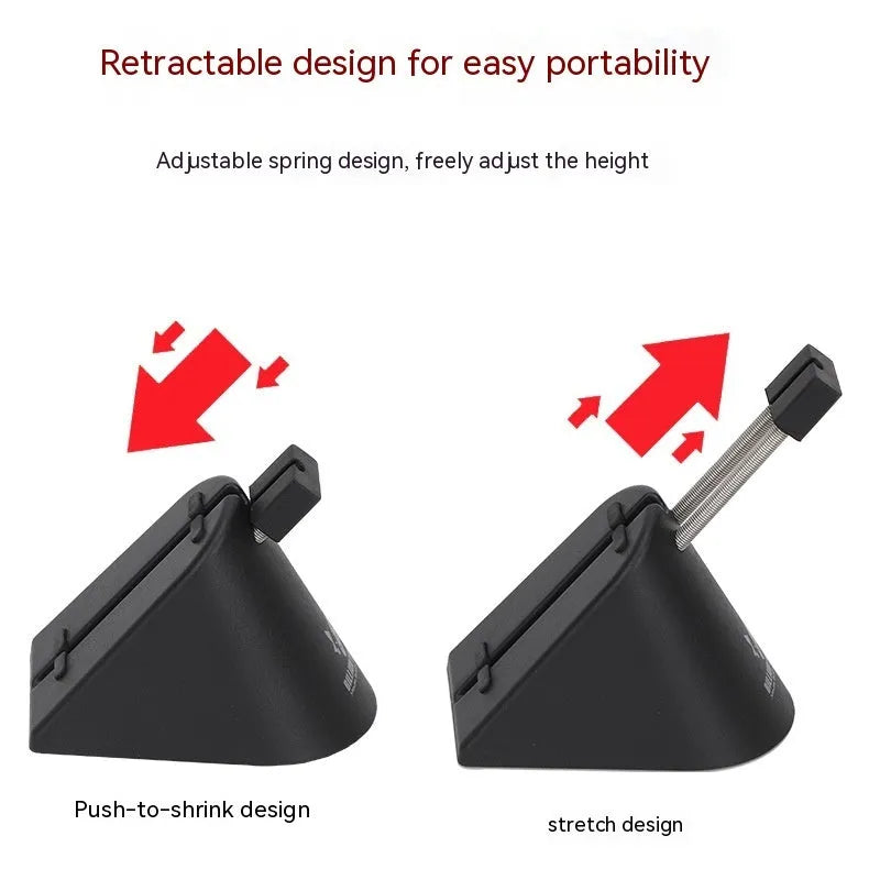Black and white ABS plastic mouse cable holder for desktop wire management.