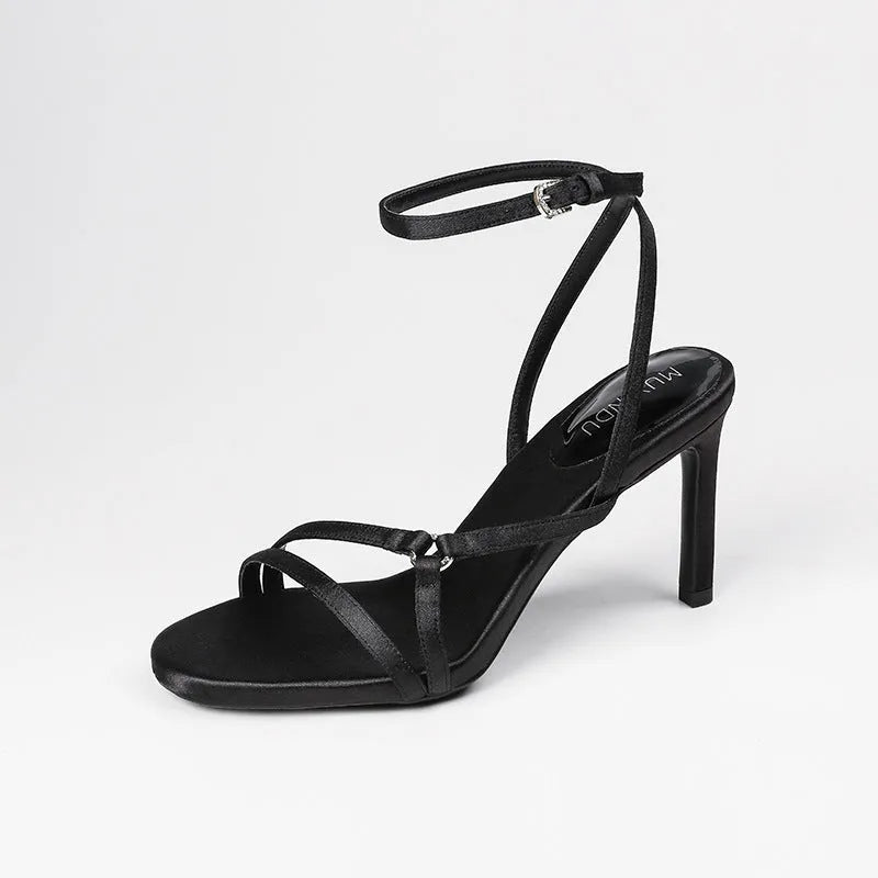 Black women's ankle-strap high heel sandals with satin finish and 8cm heel height