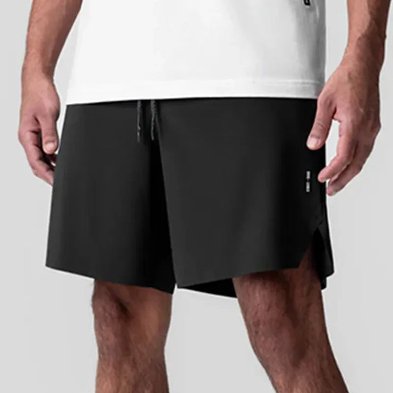 Men's grey seamless sports shorts with a straight leg and knee-length cut for summer athletics.