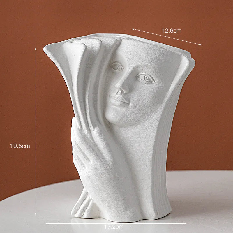 Glazed ceramic book stand in a modern design, acting as a desktop organiser and decorative ornament.