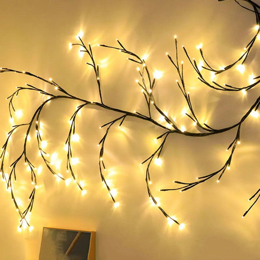 Flexible DIY willow vine Christmas garland with 144 warm white LED lights and birch bark texture.