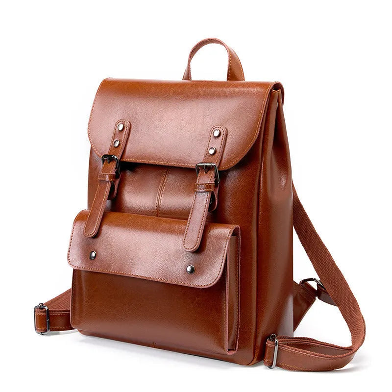 Women's leather computer backpack in black made from two-layer cowhide with hard structure