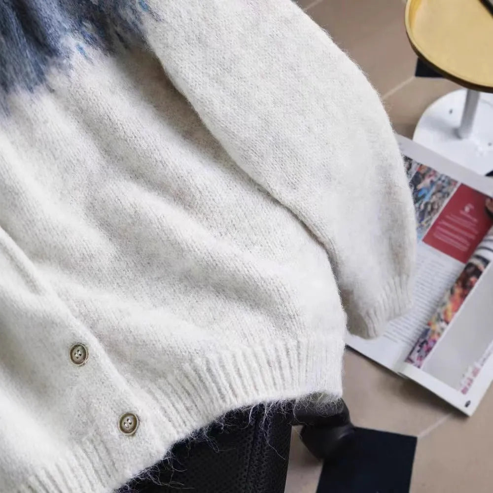 Women's loose-fit jacquard sweater coat in a contrast colour pattern, shown in milky white.
