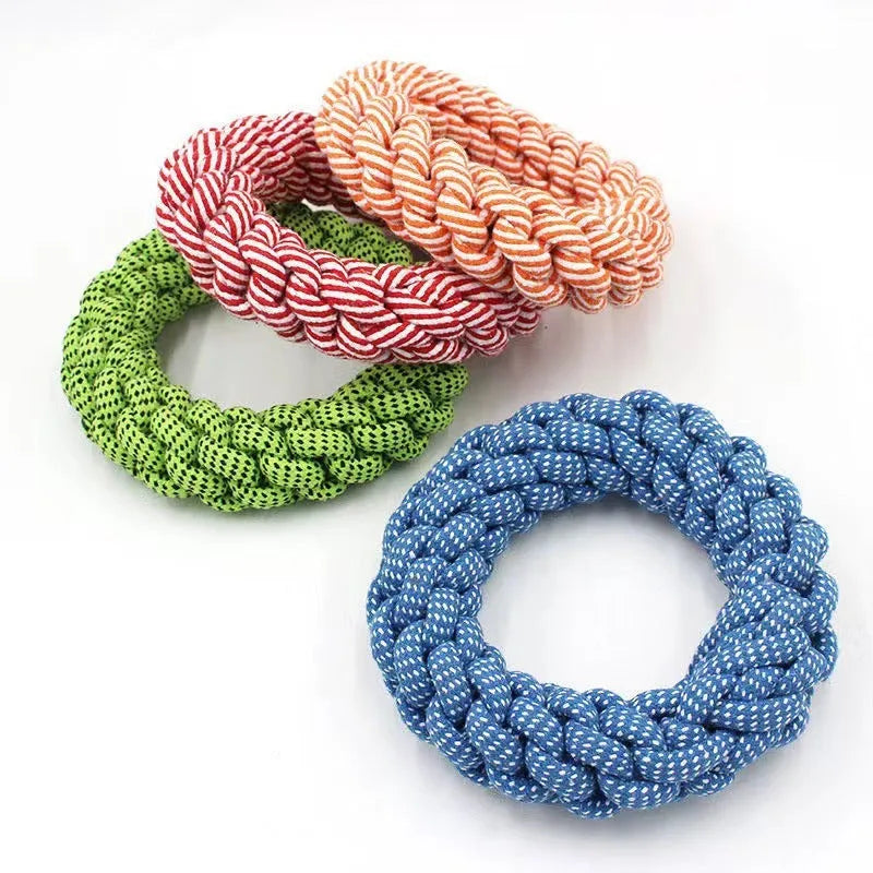 Natural cotton braided ring dog chew toy showing woven knot texture