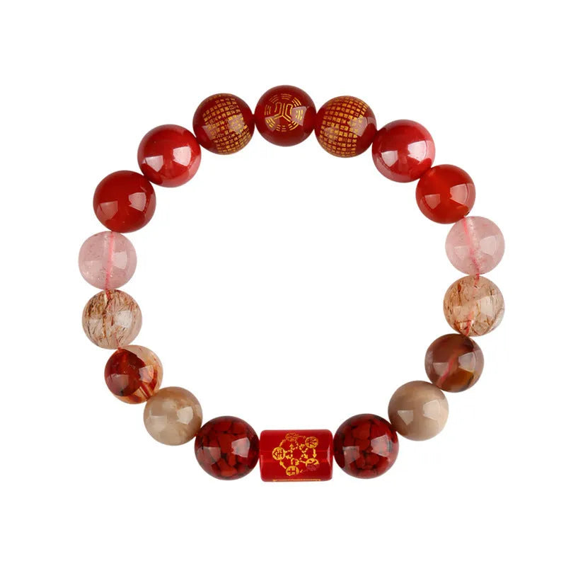 Handmade geometric crystal bracelet in gold, wood, water, fire, or soil colours on a wrist.